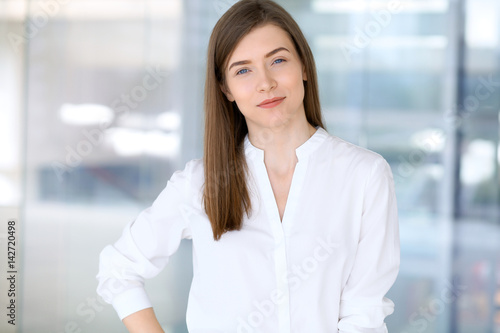 Portrait of modern business woman in the office Free Download Portrait of modern business woman in the office - GFXLoad
