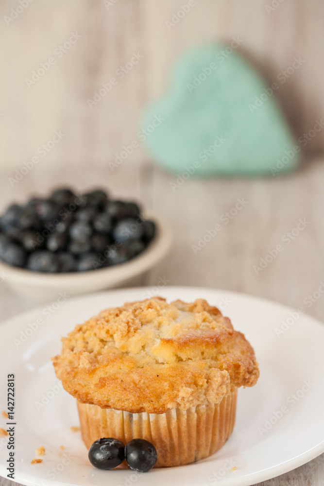 Blueberry Muffin With Heart In Background Close Up Blueberry Muffin With Heart In Background Close Up