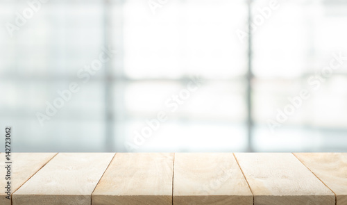 Wood table top on white abstract background.For montage product display design key visual layout © hakinmhan