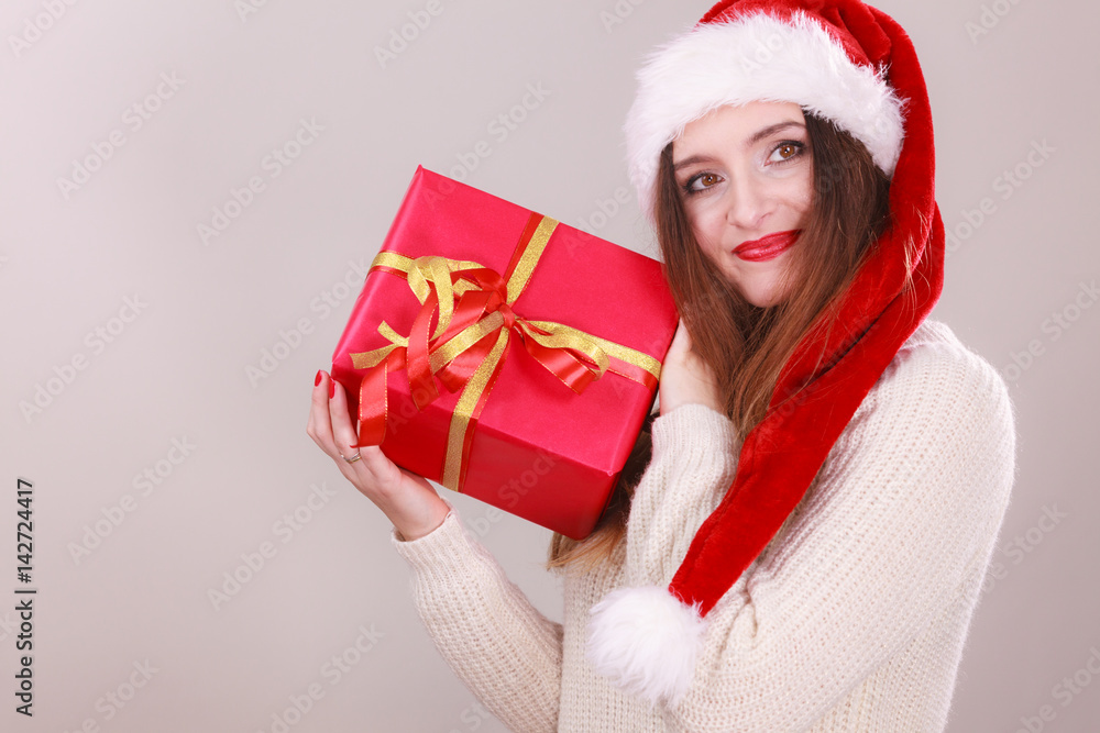 Woman holding gift box. Christmas time Woman holding gift box. Christmas time