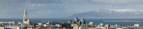 Panorama of Reykjavik skyline showing Hallgrimskirkja church cathedral and the mountains in the background. © L Galbraith