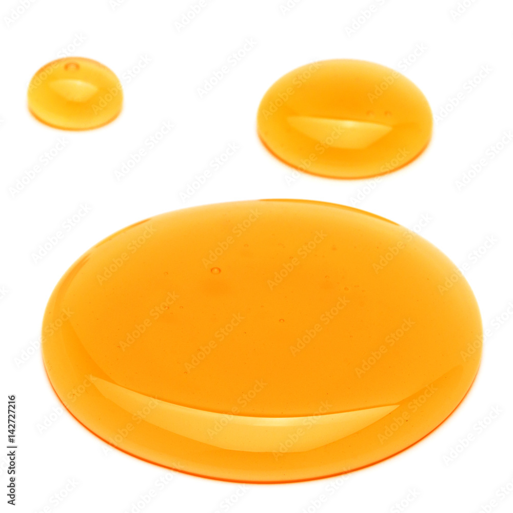 Sweet honey drips isolated on white background. Syrup droplet, nectar drops. Sweet honey drips isolated on white background. Syrup droplet, nectar drops.