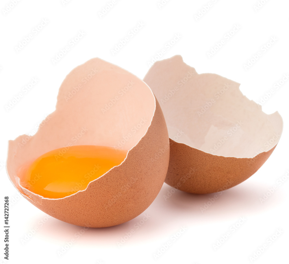 Broken egg in eggshell half isolated on white background cutout Broken egg in eggshell half isolated on white background cutout