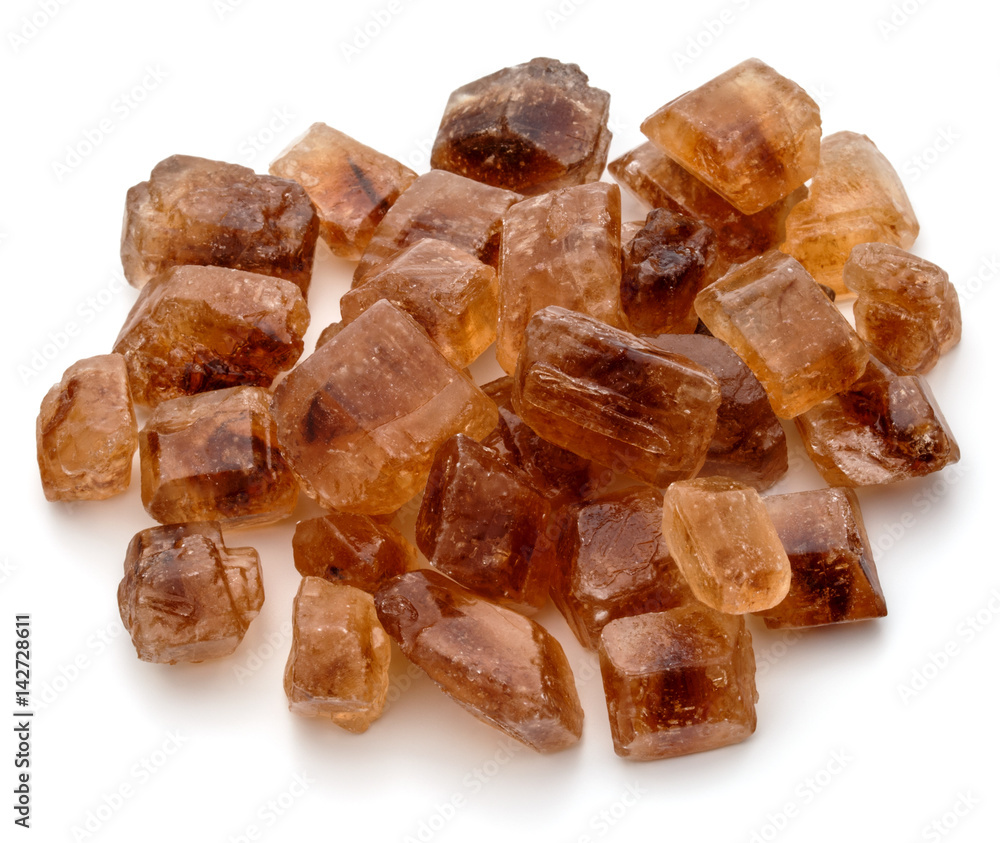 Brown caramelized lump cane sugar cube isolated on white background cutout Brown caramelized lump cane sugar cube isolated on white background cutout