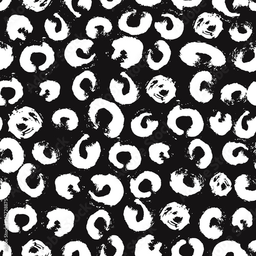 Vector seamless pattern with brush dots and strokes. White color on black background. Hand painted grange texture. Ink geometric elements. Fashion modern style. Endless fabric print.