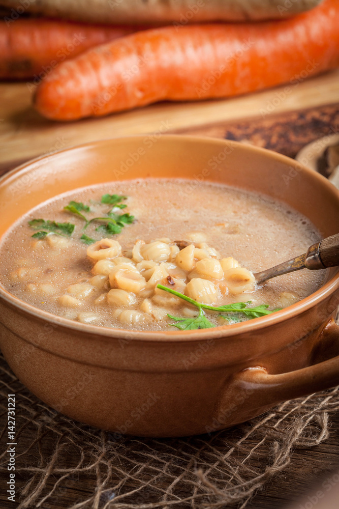 Mushroom soup on a wooden table. Mushroom soup on a wooden table.