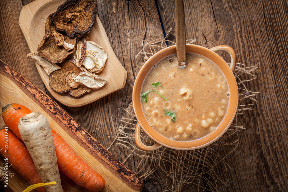 Mushroom soup on a wooden table. Mushroom soup on a wooden table.