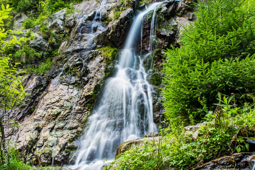 Waterfall on mountain river in Carpathian Mountains , Romania © FotoGroupMedia