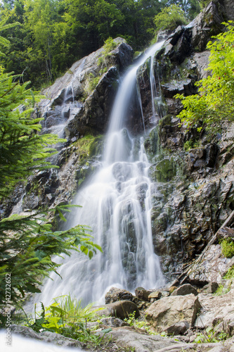 Waterfall on mountain river in Carpathian Mountains   Romania