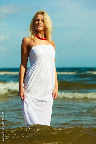 Young woman chilling out on the beach.