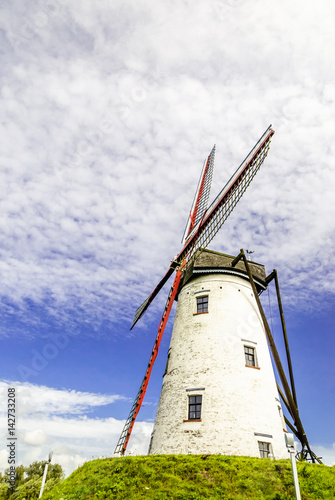 view on Old windmill with blue sky
