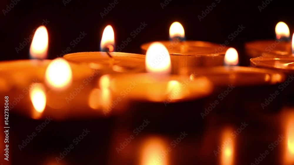 Burning candles. Candles light background. Candle flame at night. Burning candles. Candles light background. Candle flame at night.
