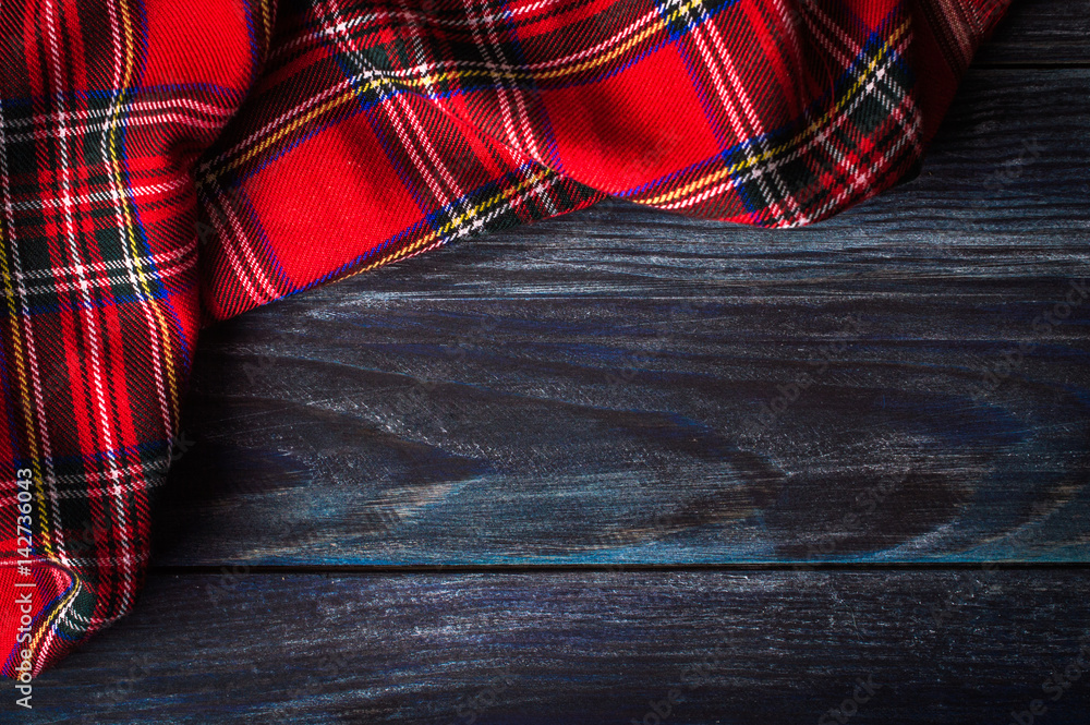 Tablecloth textile on wooden background Tablecloth textile on wooden background