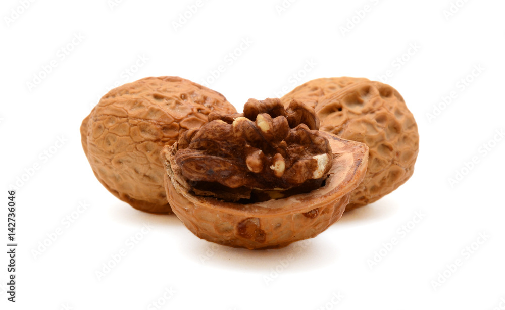 Cracked walnuts isolated on white background Cracked walnuts isolated on white background