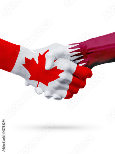 Flags Canada, Qatar countries, partnership friendship handshake concept.