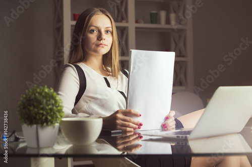 Pretty woman doing paperwork