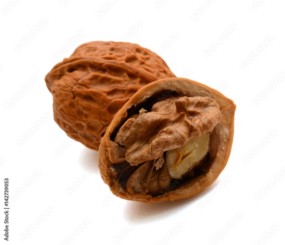 Cracked walnuts isolated on white background Cracked walnuts isolated on white background
