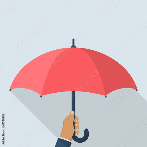 Umbrella holding in hand. Vector illustration flat design. Protection icon. Security concept. Isolated on white background.