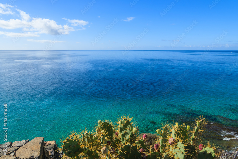 Beautiful colours of ocean lagoon on coast of Morro Jable village on Jandia peninsula, Fuerteventura, Canary Islands, Spain