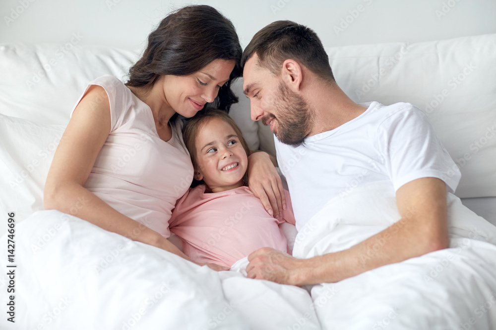 happy family in bed at home happy family in bed at home