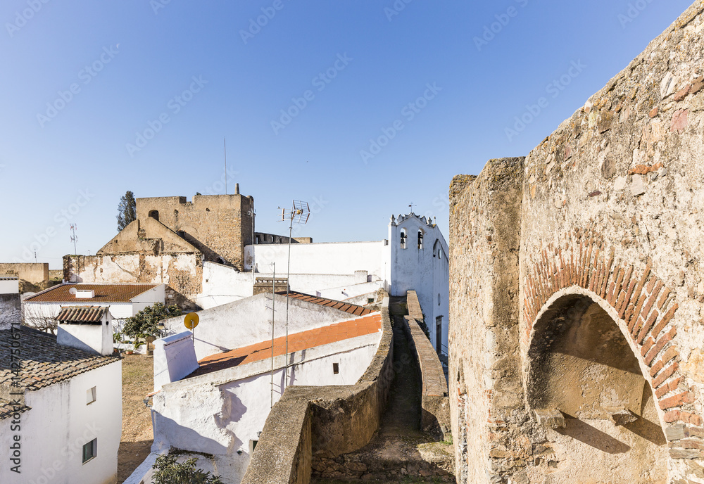 white houses and the castle in Ouguela village, Campo Maior, Portalegre district, Portugal