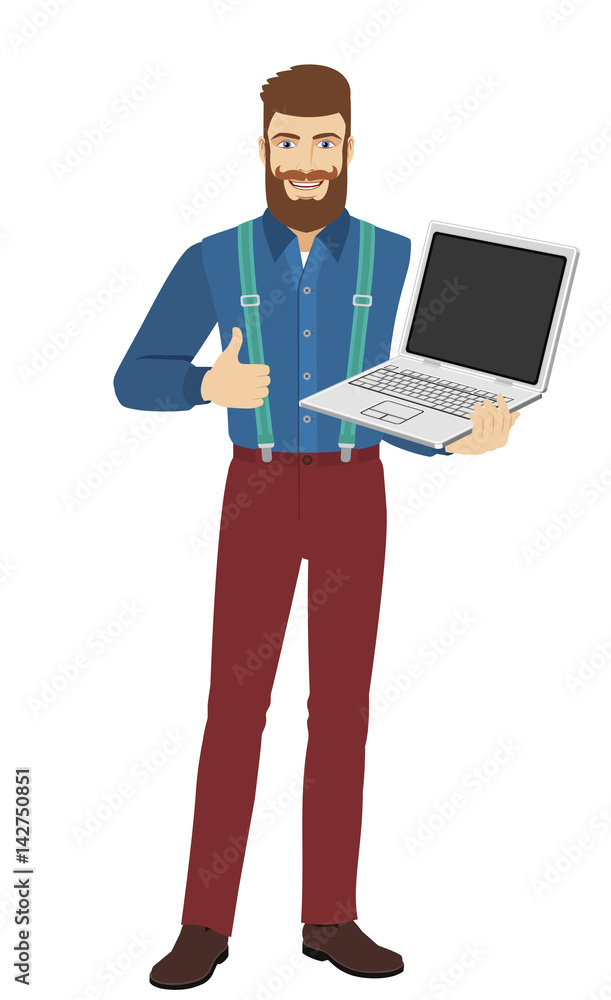 Hipster holding laptop notebook and shows the thumb up Hipster holding laptop notebook and shows the thumb up