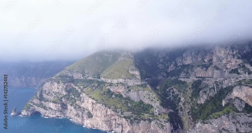 Aerial flying over rocky Amalfi coast. Tyrrhenian sea. Campania, Italy. Aerial flying over rocky Amalfi coast. Tyrrhenian sea. Campania, Italy.