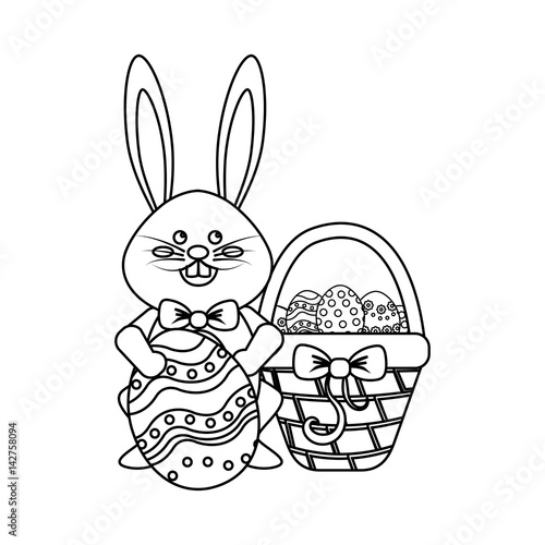 figure rabbit easter with eggs inside of hamper