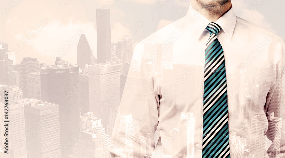 Handsome business man with overlay cityscape Handsome business man with overlay cityscape