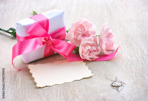 Mother's Day background, gift box, three pink carnations, paper blank © Oksana Churakova