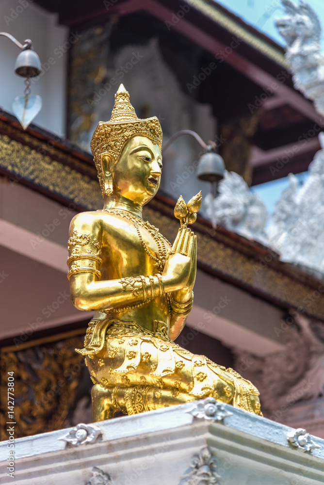 Golden buddha statue in thai temple.