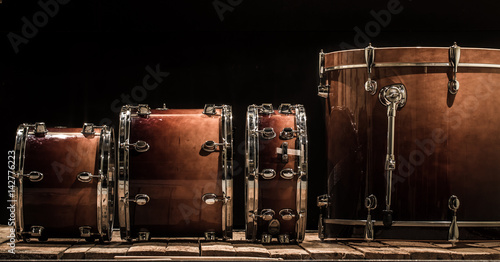 Leinwand Poster drums, musical percussion instruments on a black background