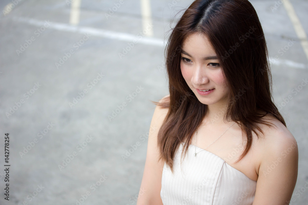 Portrait of thai china adult beautiful girl relax and smile Portrait of thai china adult beautiful girl relax and smile