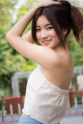 Portrait of thai china adult beautiful girl relax and smile