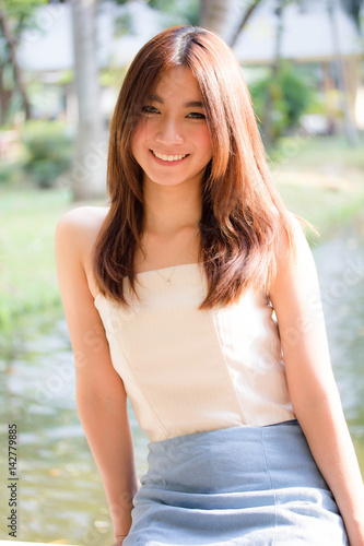 Photography Portrait of thai china adult beautiful girl relax and smile