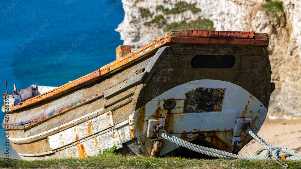 Old boat, seen at Flamborough North Landing, near Bridlington, East Riding of Yorkshire, UK