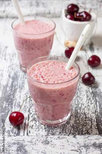 smoothie with cherry in a glass