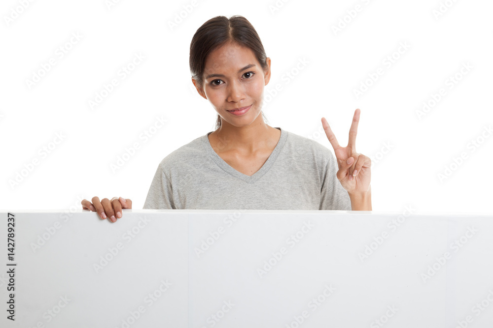 Young Asian woman show victory sign with blank sign. Young Asian woman show victory sign with blank sign.