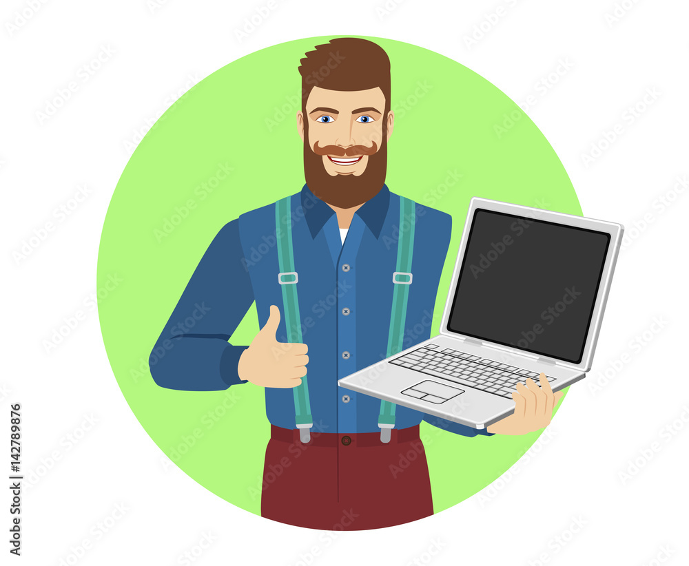 Hipster holding laptop notebook and shows the thumb up Hipster holding laptop notebook and shows the thumb up