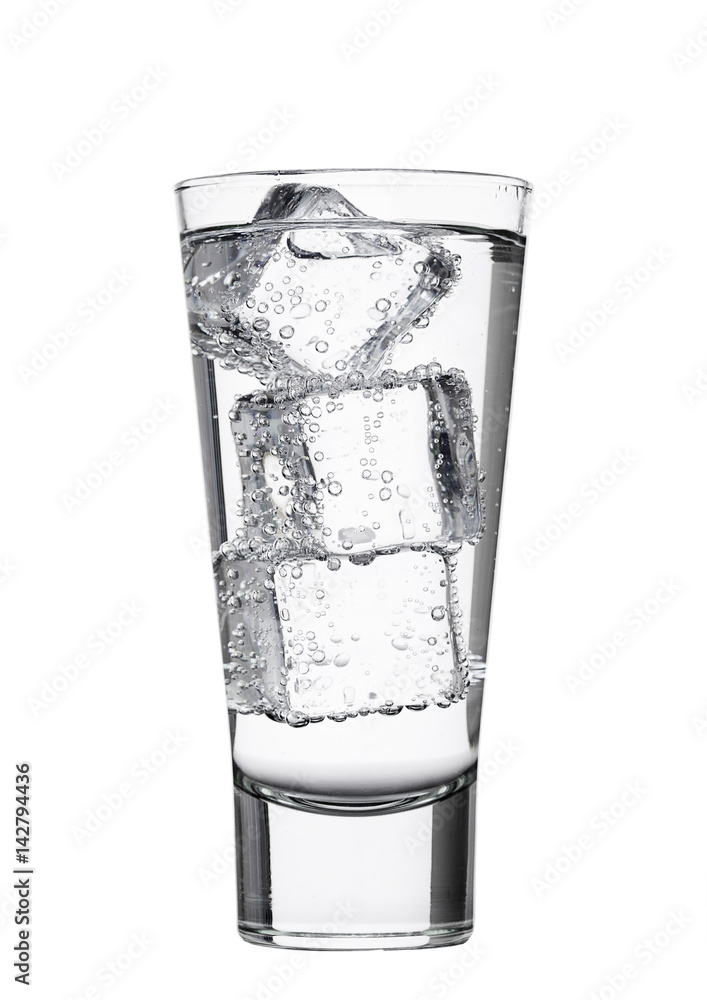 Glass of sparkling mineral water with ice cubes Glass of sparkling mineral water with ice cubes