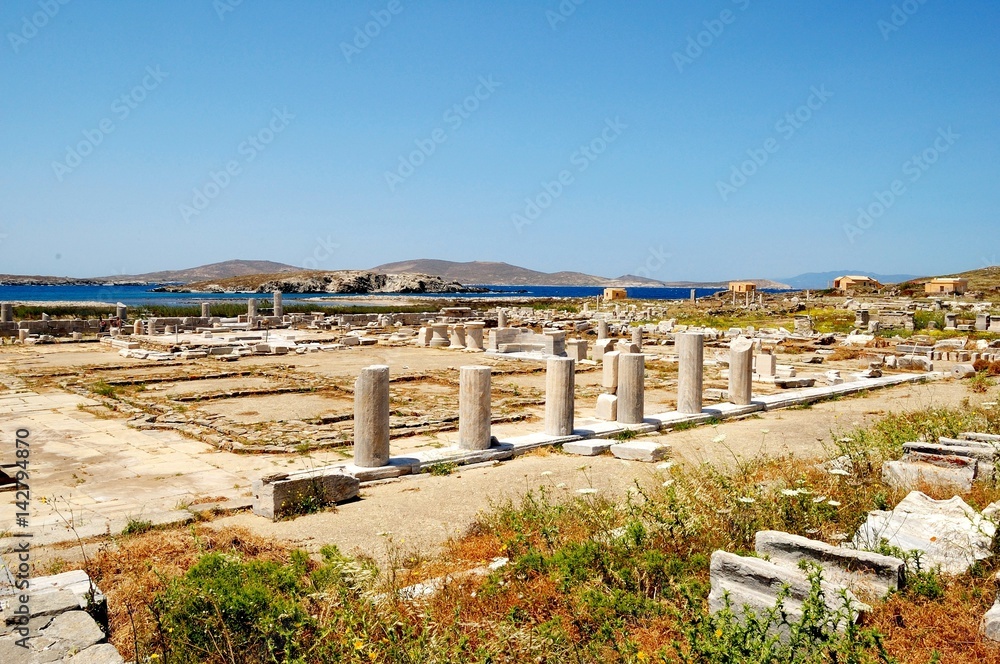 Ruins Of Delos, Greece/Remains of antique marble Collonade. Architecture Of Ancient Greece, it`s one of  largest museums of Antiquity under the open sky