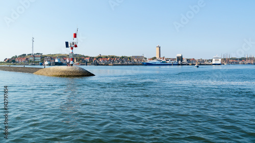 Harbor and Brandaris lighthouse on Terschelling, Netherlands photo