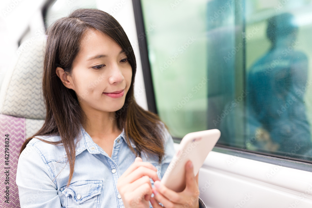 Woman using smartphone and travel on mobile phone Woman using smartphone and travel on mobile phone
