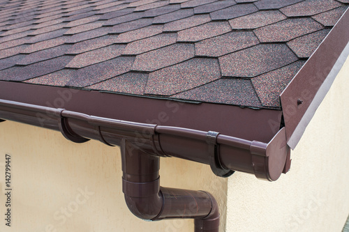 plastic drainage on the roof near the shingles