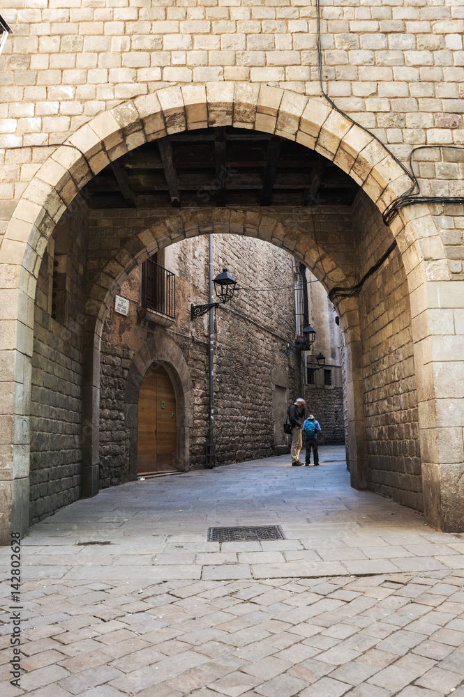 Narrow street in gothic quarter of Barcelona Narrow street in gothic quarter of Barcelona