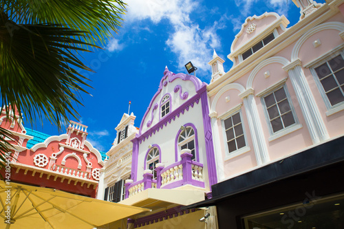 Example of vibrant and colorful Dutch architecture on buildings in Caribbean city of downtown Oranjestad, Aruba  photo