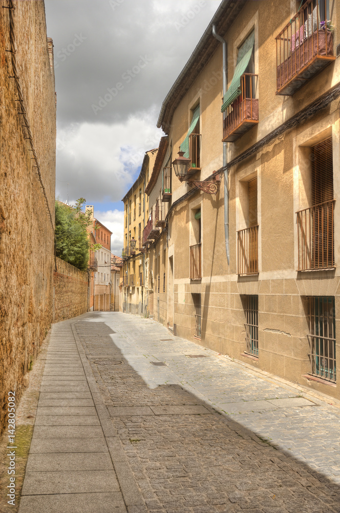 Ancient narrow street in Segovia, Spain