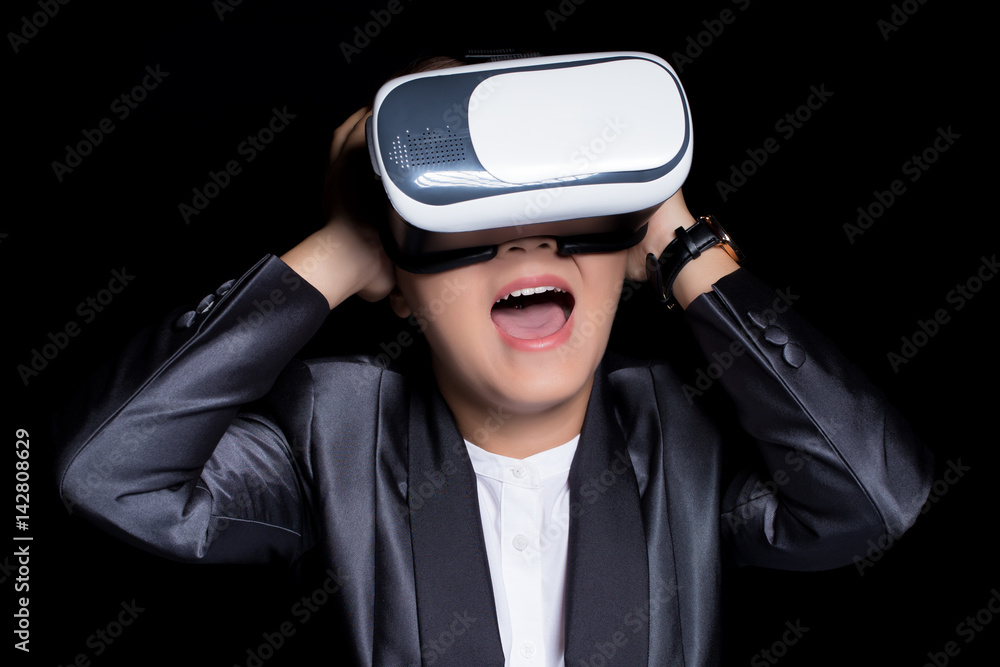 Happy woman wearing VR technology with business suit