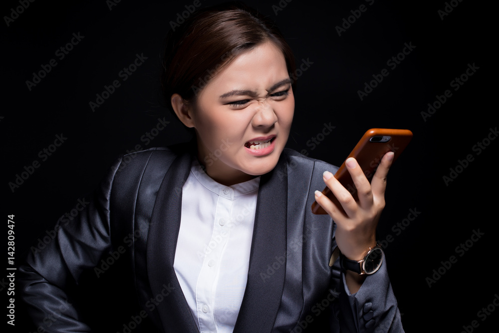 Woman calling the smartphone and she feel angry Woman calling the smartphone and she feel angry
