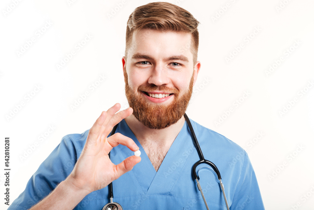 Portrait of a smiling young male medical doctor or nurse Portrait of a smiling young male medical doctor or nurse